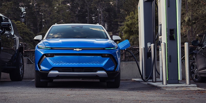 Chevrolet Equinox EV connected to a charging station
